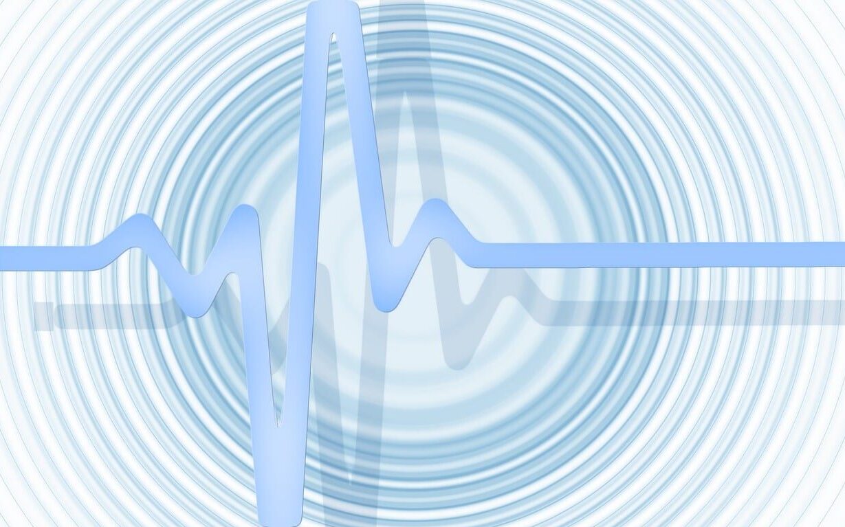 Data governance maturity assessment illustrated through structured waveform representing data flow and quality